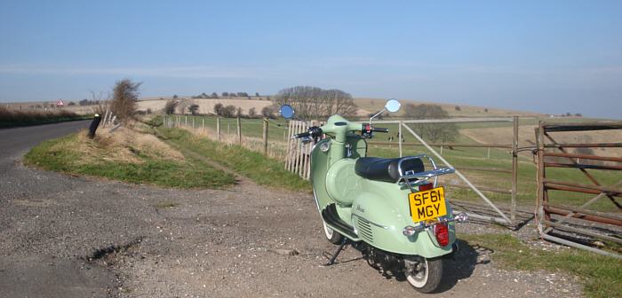 Biking up the south downs on a classic 60s style scooter - bostal road near Steyning